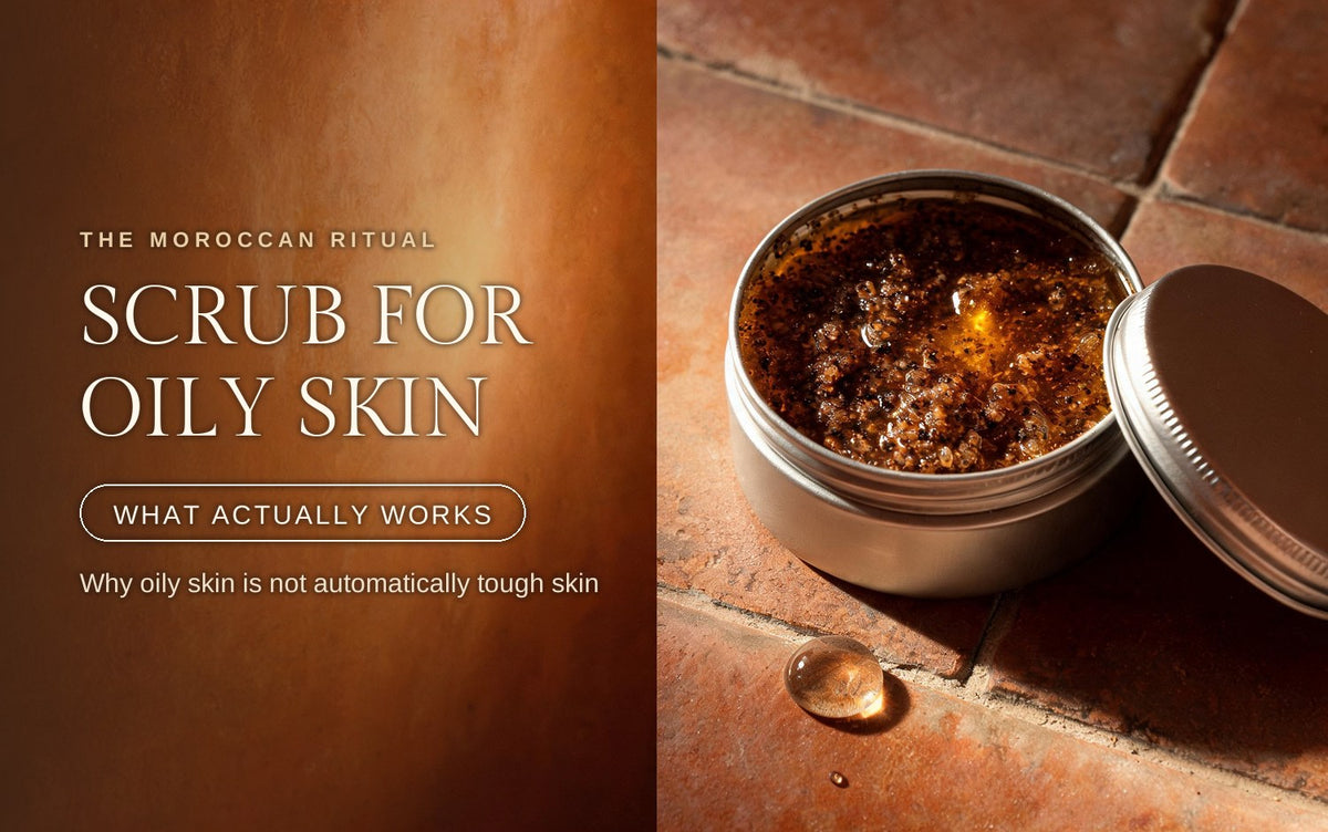 Small open metal tin of dark oil-based face scrub with its lid propped alongside, fine granules glinting in glossy oil under a warm golden highlight, a single water droplet beaded on the terracotta tile beside it